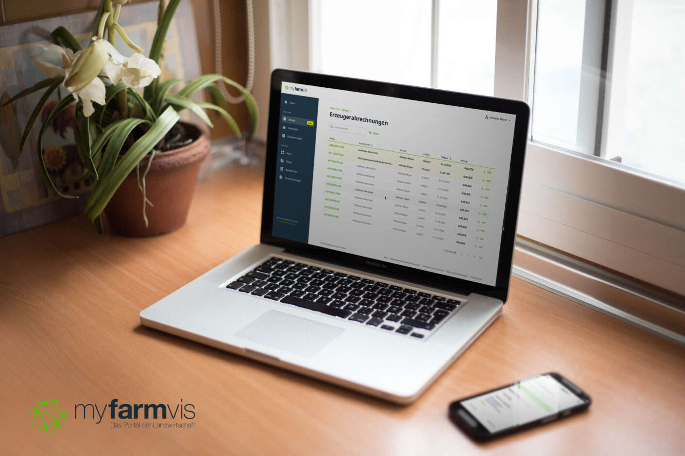Arbeitsplatz mit Laptop und Smartphone Kundenportal myfarmvis.com